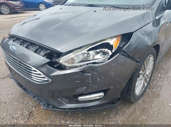 1FADP3N24GL406564 2016 FORD FOCUS Gray Widok z przodu