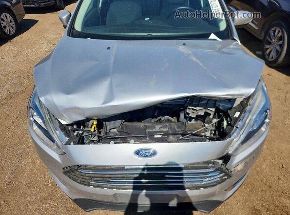 1FADP3N25GL326240 2016 FORD FOCUS Silver Вид задньої частини салону