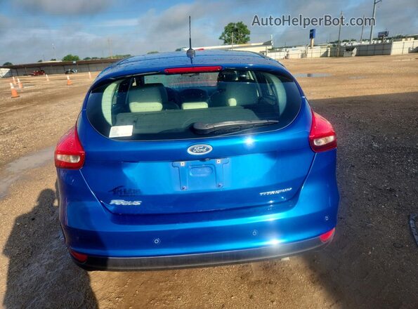 1FADP3N27JL323783 2018 FORD FOCUS Blue Rear view