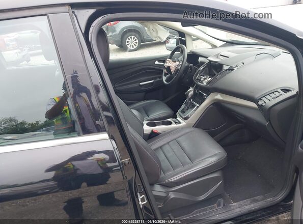 1FADP5CU0GL116130 2016 FORD C-MAX ENERGI Black Front interior view