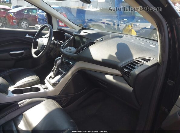 1FADP5CU3GL110435 2016 FORD C-MAX ENERGI Black Widok wnętrza z przodu