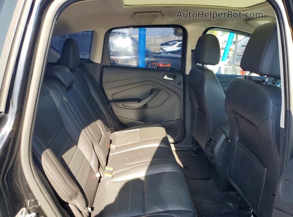 1FADP5CU7GL105528 2016 FORD C-MAX Black Vista de los asientos traseros