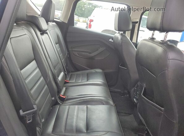 1FADP5DU0HL118718 2017 FORD C-MAX Blue Vista de los asientos traseros