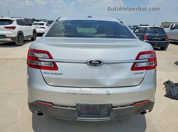 1FAHP2D82GG129259 2016 FORD TAURUS Silver Вид ззаду