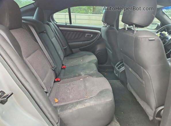 1FAHP2E80HG116512 2017 FORD TAURUS Silver Rear seats view