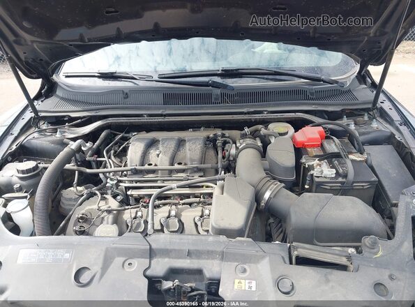 1FAHP2E86HG110813 2017 FORD TAURUS Черный Вид сзади