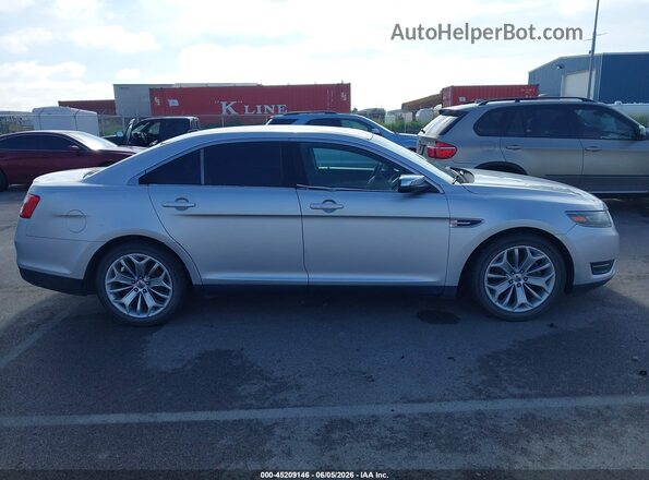 1FAHP2F83GG125086 2016 FORD TAURUS Silver Vista interior trasera