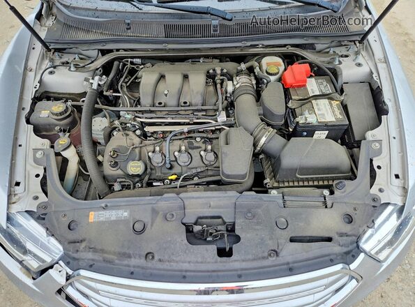 1FAHP2F83JG130487 2018 FORD TAURUS Silver Rear interior view