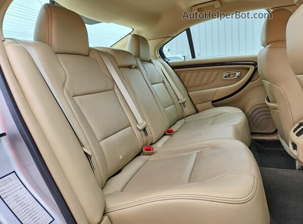 1FAHP2F83JG130487 2018 FORD TAURUS Silver Rear seats view