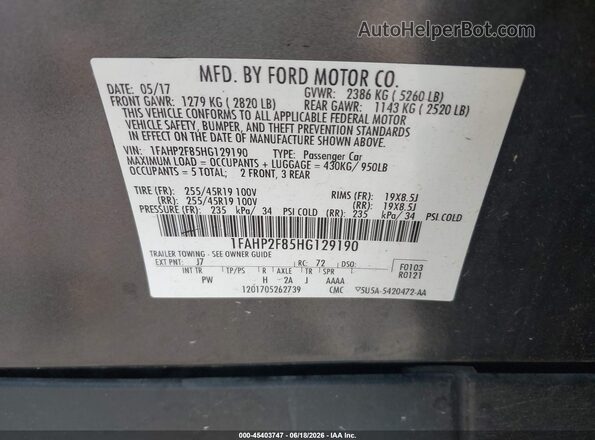 1FAHP2F85HG129190 2017 FORD TAURUS Gray Vista del compartimento del motor