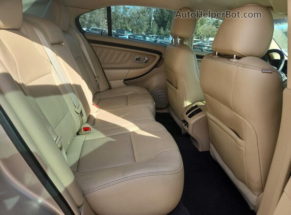 1FAHP2F85JG105218 2018 FORD TAURUS Gold Rear seats view