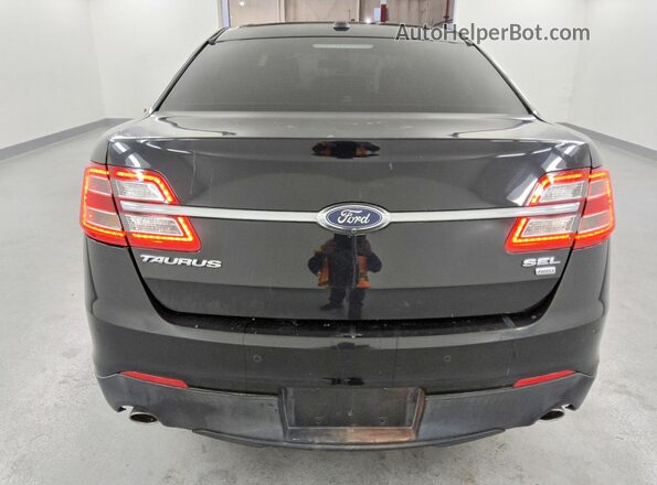 1FAHP2H82HG126292 2017 FORD TAURUS Black Вид ззаду