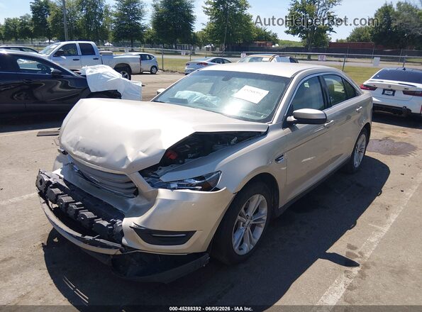 1FAHP2H85HG112046 2017 FORD TAURUS Бежевый Передняя левая четверть