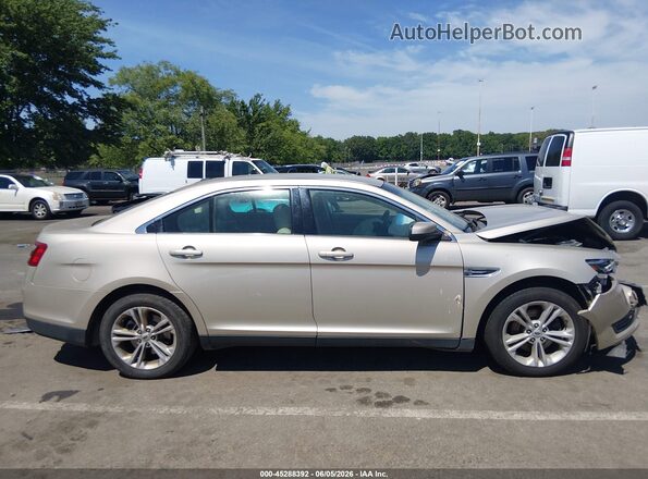 1FAHP2H85HG112046 2017 FORD TAURUS Бежевый Вид задней части салона