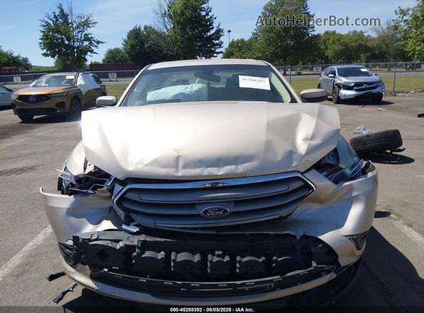 1FAHP2H85HG112046 2017 FORD TAURUS Бежевый Вид спереди