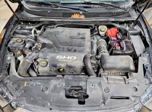 1FAHP2KT6GG124752 2016 FORD TAURUS Black Rear interior view