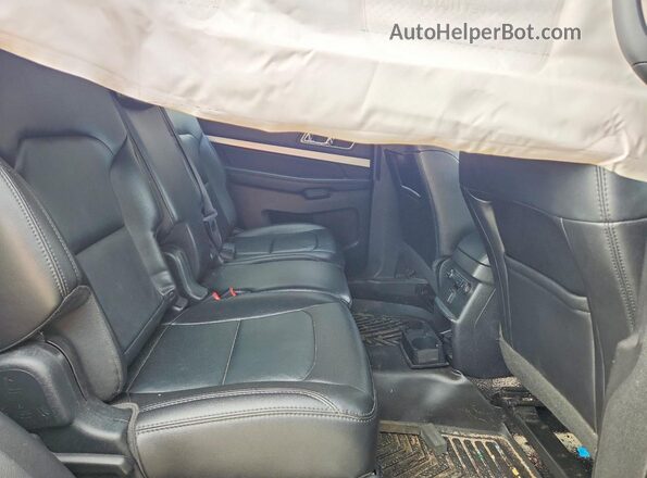 1FM5K8D82HGC79755 2017 FORD EXPLORER Black Rear interior view