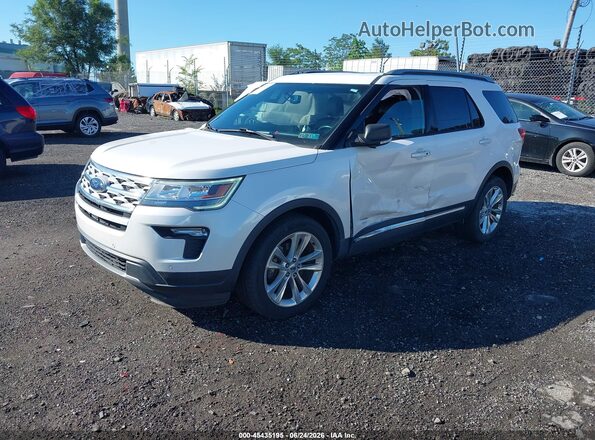 1FM5K8D85KGA82764 2019 FORD EXPLORER White Vista tres cuartos delantera izquierda