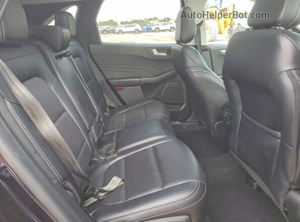 1FMCU0CZ4MUB16260 2021 FORD ESCAPE Черный Вид задней части салона