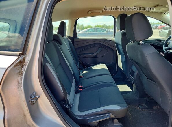 1FMCU0F7XGUB80074 2016 FORD ESCAPE Серебряный Вид задней части салона