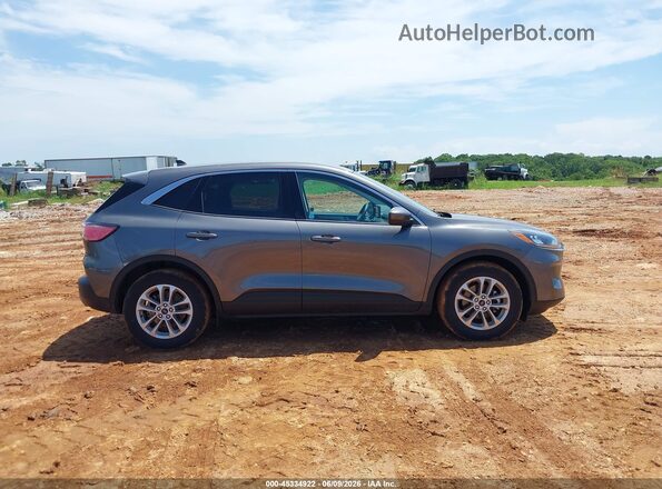 1FMCU0G65MUA33498 2021 FORD ESCAPE Gray Vista interior trasera