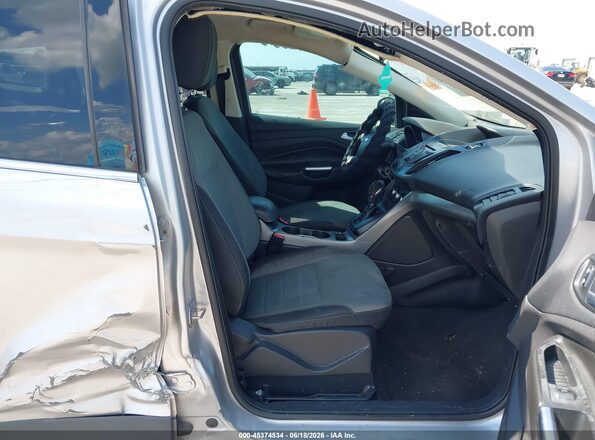 1FMCU0G76GUB97176 2016 FORD ESCAPE Серебряный Вид салона спереди