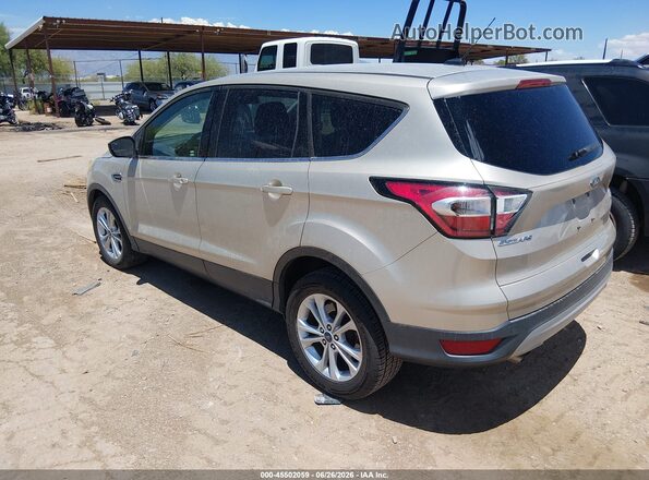 1FMCU0GD0HUC80013 2017 FORD ESCAPE Gold Rear left