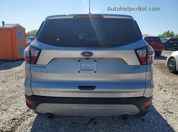 1FMCU0GD0HUF04090 2017 FORD ESCAPE Silver Widok z tyłu