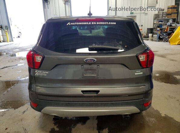 1FMCU0GD0KUB69663 2019 FORD ESCAPE Charcoal Rear view