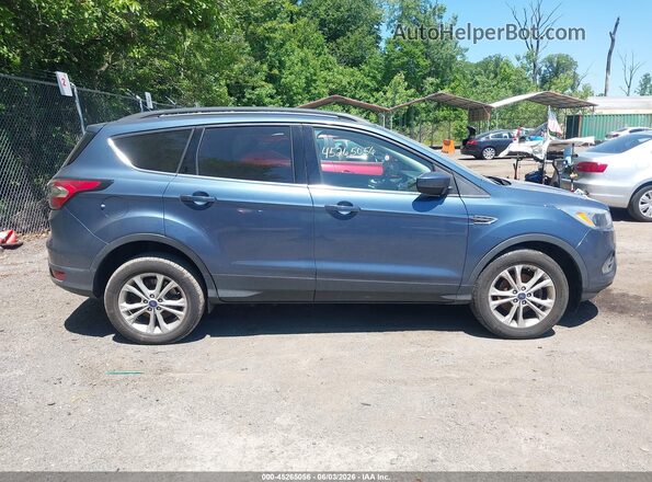 1FMCU0GD1JUC62464 2018 FORD ESCAPE Синий Вид задней части салона