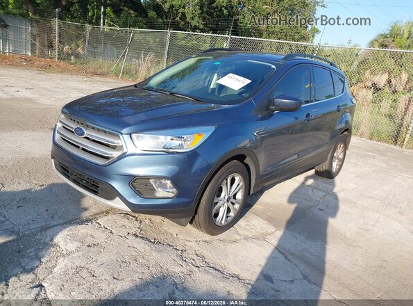 1FMCU0GD2JUB97611 2018 FORD ESCAPE Blue Առջևի ձախ երեք քառորդ տեսարան