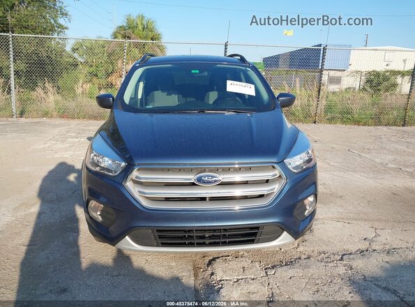 1FMCU0GD2JUB97611 2018 FORD ESCAPE Blue Սարքավորումների վահանակի տեսք