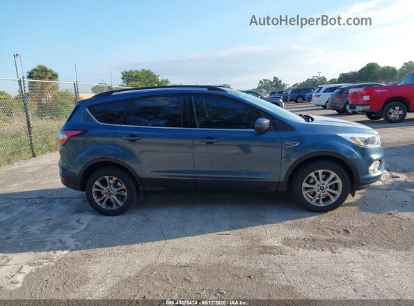 1FMCU0GD2JUB97611 2018 FORD ESCAPE Blue Սալոնի հետևի տեսք