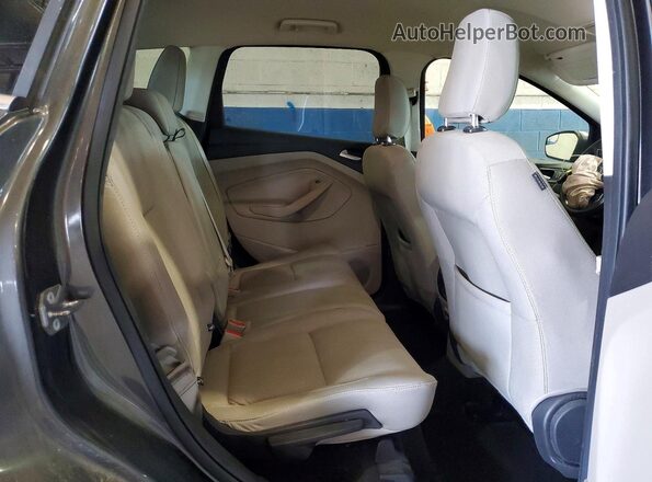 1FMCU0GD3JUC04596 2018 FORD ESCAPE Gray Vista interior trasera