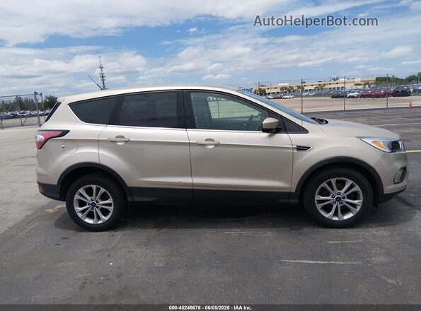 1FMCU0GD4HUD24725 2017 FORD ESCAPE Beige Вид задньої частини салону