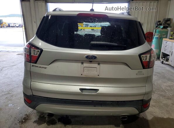1FMCU0GD4JUD60615 2018 FORD ESCAPE Silver Rear view