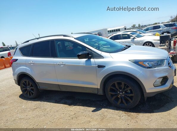 1FMCU0GD5KUB80500 2019 FORD ESCAPE Silver Widok wnętrza z tyłu