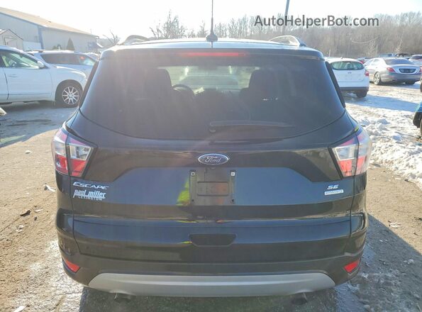 1FMCU0GD6JUB71156 2018 FORD ESCAPE Black Rear view