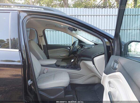 1FMCU0GD7JUB16165 2018 FORD ESCAPE Black Front interior view