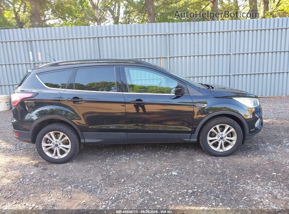1FMCU0GD7JUB16165 2018 FORD ESCAPE Black Rear interior view