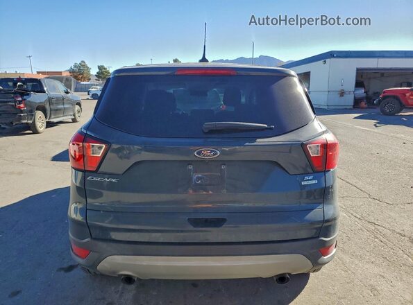 1FMCU0GD7KUC27705 2019 FORD ESCAPE Gray Rear view