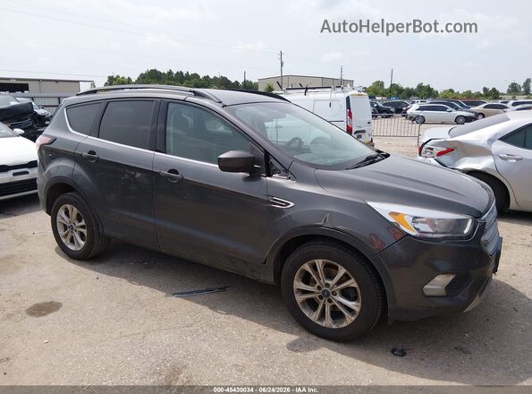 1FMCU0GD8JUA63699 2018 FORD ESCAPE Black Widok wnętrza z tyłu