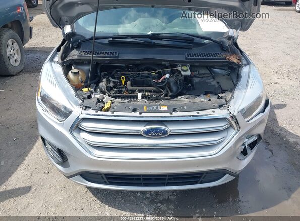 1FMCU0GD8KUA16674 2019 FORD ESCAPE Silver უკანა ხედი