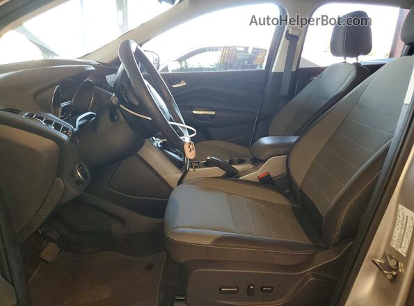 1FMCU0GX4GUB38983 2016 FORD ESCAPE Silver Widok wnętrza z przodu