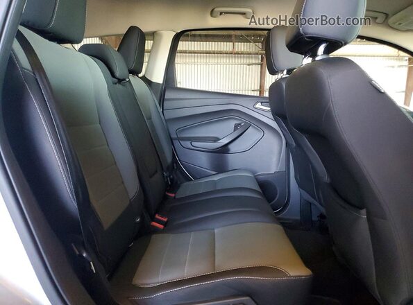 1FMCU0GX4GUB38983 2016 FORD ESCAPE Silver Widok wnętrza z tyłu