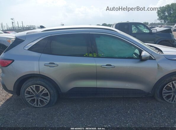 1FMCU0H68MUB18320 2021 FORD ESCAPE Silver Vista interior trasera