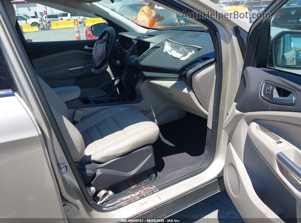 1FMCU0HD3JUC76817 2018 FORD ESCAPE Gold Front interior view