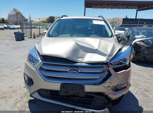 1FMCU0HD3JUC76817 2018 FORD ESCAPE Gold Rear interior view