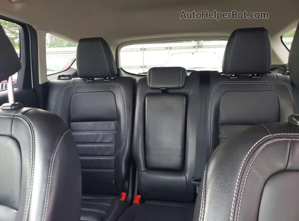 1FMCU0HD8JUD48854 2018 FORD ESCAPE White Vista de los asientos traseros