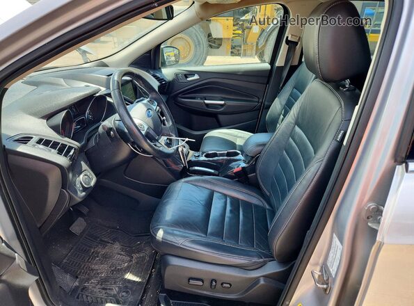 1FMCU0J95GUC42649 2016 FORD ESCAPE Silver Front interior view